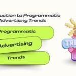 3D illustration with a megaphone, emojis, hearts, and a mobile screen showing the word 'TRENDING.' Text reads 'Introduction to Programmatic Advertising Trends' with keywords Programmatic, Advertising, and Trends highlighted in neon green boxes